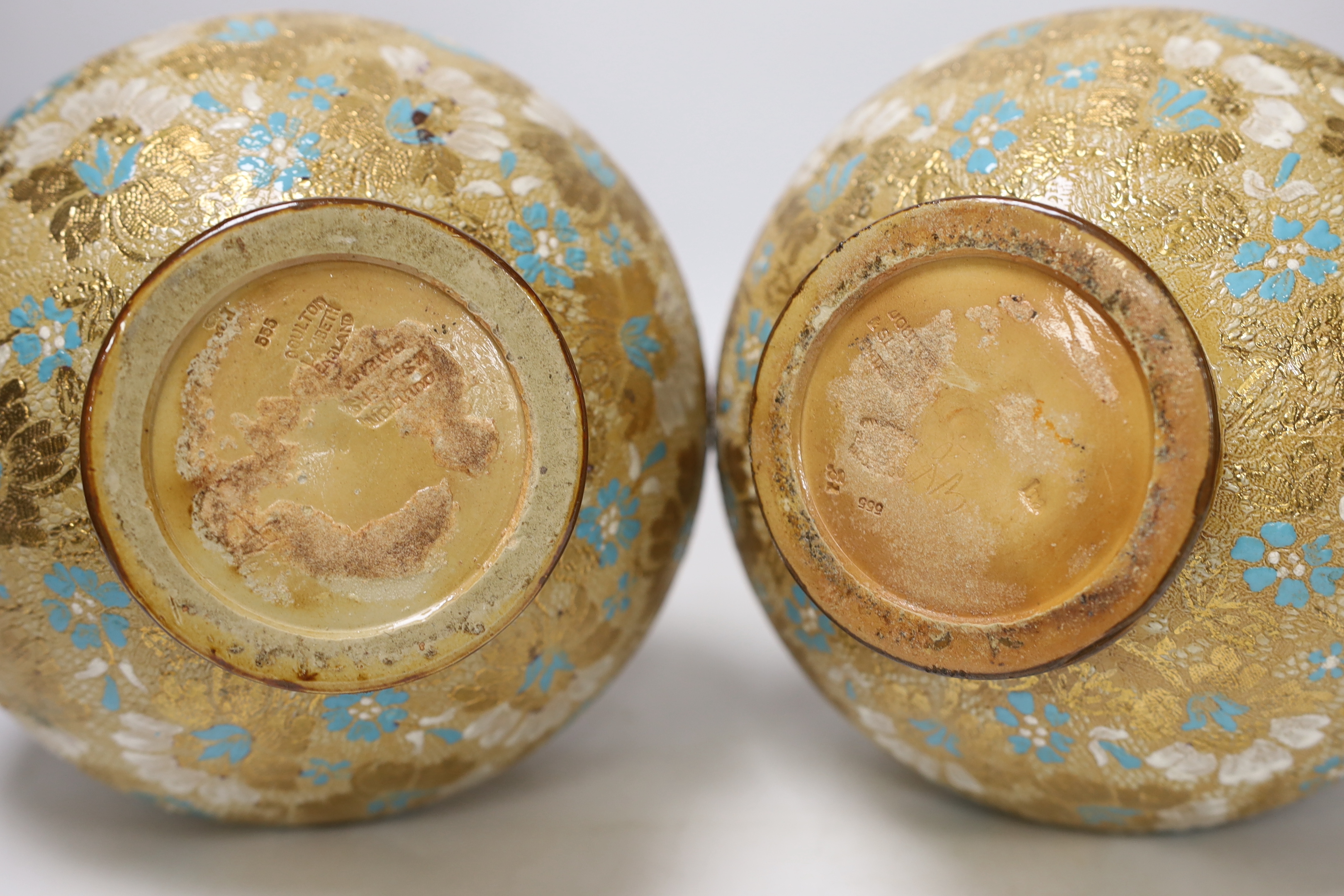 A pair of Royal Doulton Lambeth Slaters patent bottle vases and another similar vase, 41cm